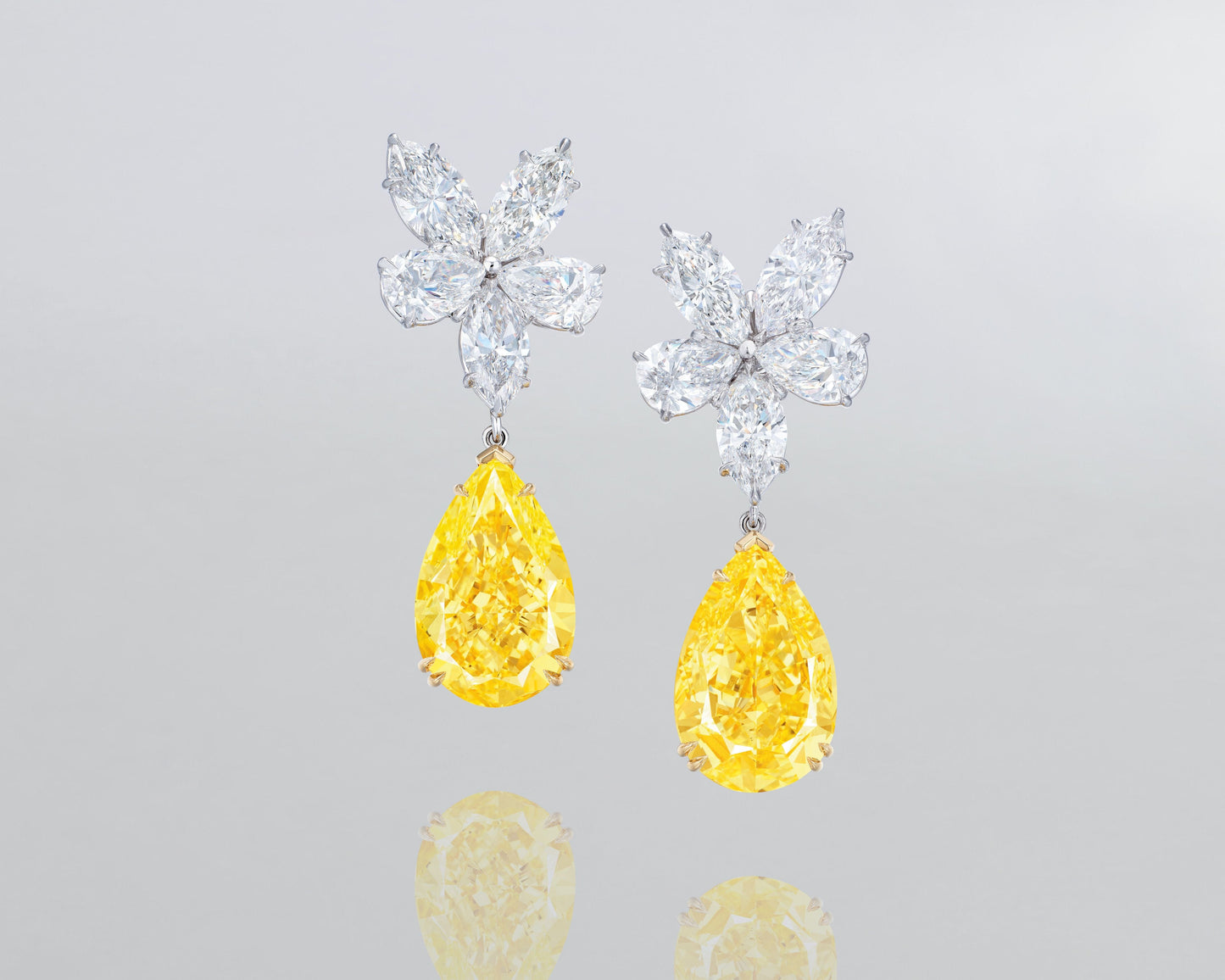 21.53 carat Pear Shape Fancy Yellow and White Diamond Cluster Earrings