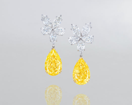 21.53 carat Pear Shape Fancy Yellow and White Diamond Cluster Earrings