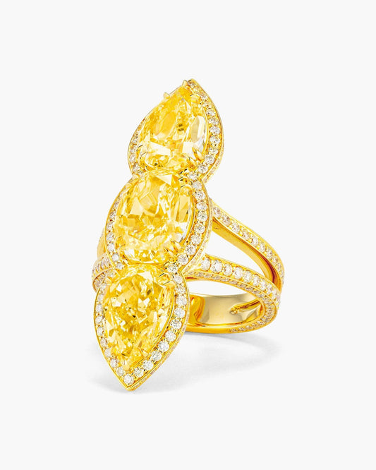 Three-Stone Oval and Pear Shape Yellow Diamond Ring