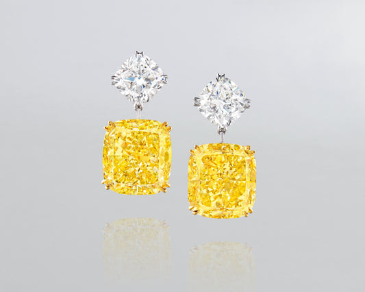 29.98 carat Cushion Cut Fancy Intense Yellow and White Diamond Earrings