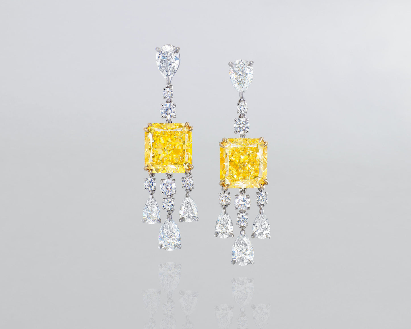 9.74 carat Radiant Cut Fancy Yellow and White Diamond Earrings
