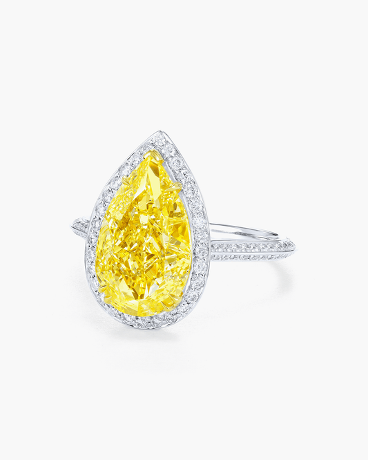 3.71 carat Pear Shape Yellow and White Diamond Ring