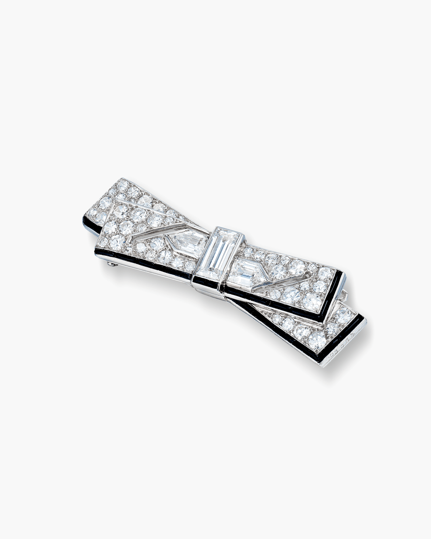 Art Deco Diamond and Onyx Bow Knot Brooch by Cartier