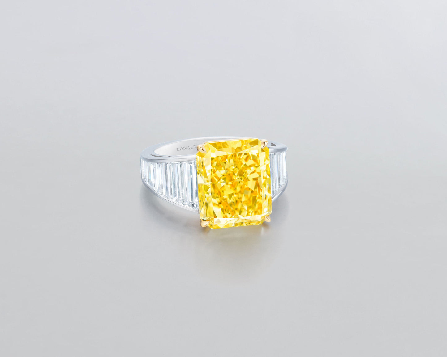 8.88 carat Radiant Cut Fancy Intense Yellow Diamond Ring