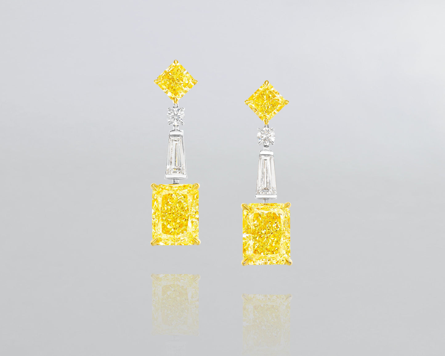 6.28 carat Radiant Cut Fancy Yellow and White Diamond Earrings