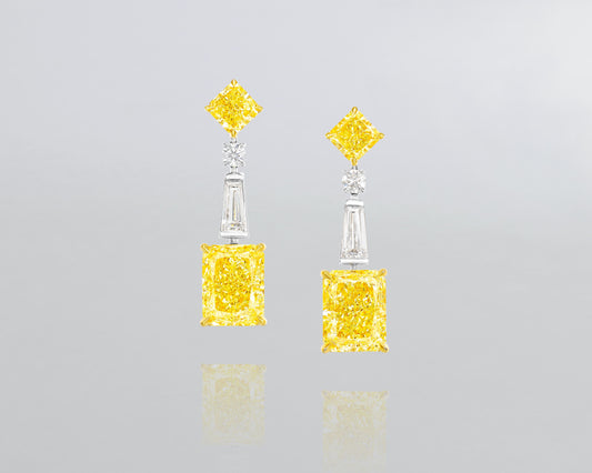 6.28 carat Radiant Cut Fancy Yellow and White Diamond Earrings