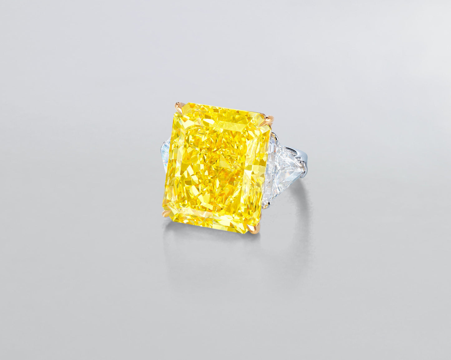26.25 carat Radiant Cut Fancy Vivid Yellow Diamond Ring