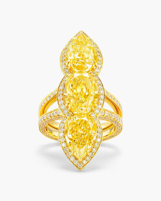 Three-Stone Oval and Pear Shape Yellow Diamond Ring