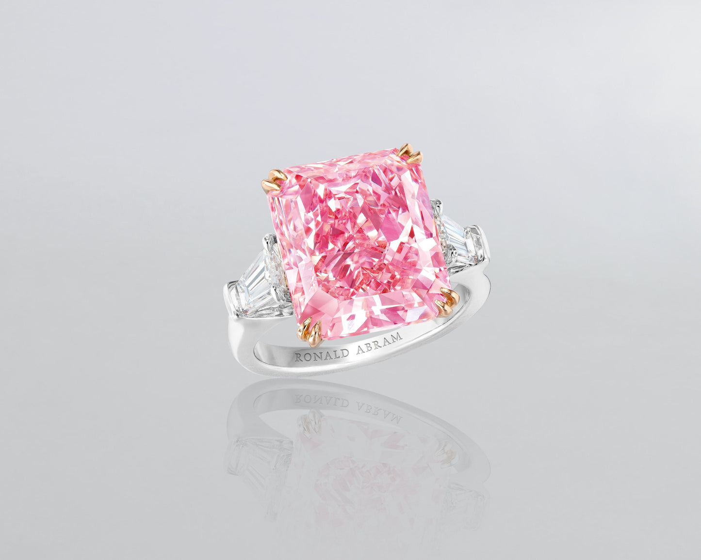 10.24 carat Radiant Cut Fancy Intense Purplish-Pink Diamond Ring