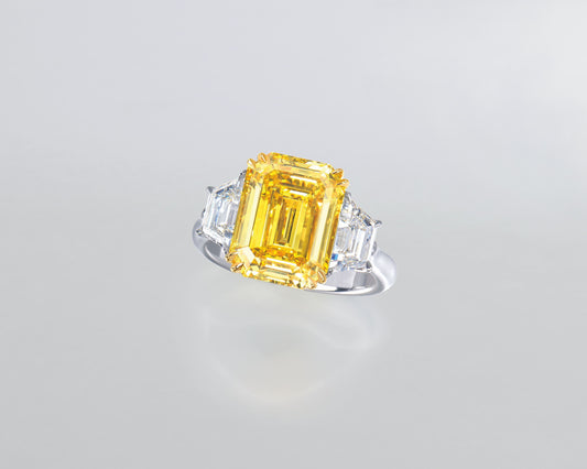 5.34 carat Emerald Cut Fancy Vivid Yellow Diamond Ring